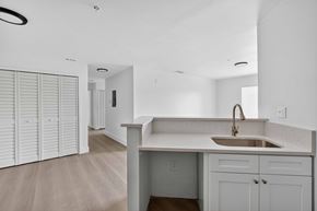 Ft. Myers apartment for rent - A kitchen with a sink and a white counter top. at Cascades at Clear Lake Apartments, Ft. Myers, 33908