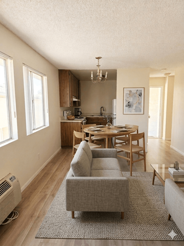 San Diego apartment for rent - A well-lit kitchen with a dining table and chairs.