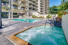 National City apartment for rent - a swimming pool with a building in the background