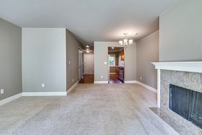 Tacoma apartment for rent - Living Room with Fireplace at Village at The Pointe Apartments, Tacoma, WA