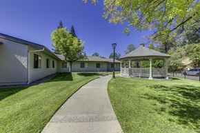 Auburn apartment for rent - A white building with a gazebo in front of it.