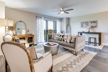 Merritt Island apartment for rent - a living room with furniture and a ceiling fan