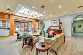 Poway apartment for rent - A living room with a couch, chairs, and a coffee table.