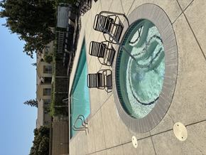 Selma apartment for rent - A small pool with a fountain in the middle.