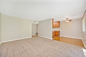 Fair Oaks apartment for rent - A spacious room with a carpeted floor and a ceiling fan.