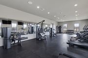 Tallahassee townhouse for rent - A spacious gym with various exercise equipment.