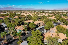 Las Vegas apartment for rent - A bird's eye view of a residential area with houses and trees.