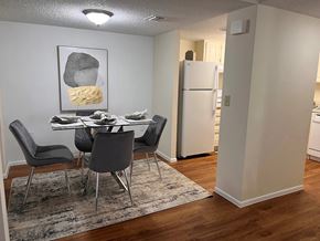 Daytona Beach apartment for rent - A dining room with a table and chairs.