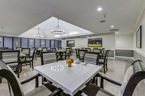 Auburn apartment for rent - A dining room with a table set for two.