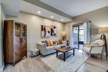 Deland apartment for rent - a living room with a couch and a table