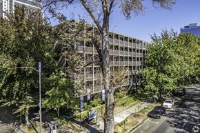 Sacramento apartment for rent - an office building with trees in front of it