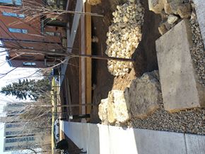 Minneapolis apartment for rent - A wall with a stone and concrete base.