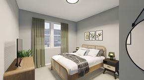 Traverse City apartment for rent - A bedroom with a large bed and a window with curtains.