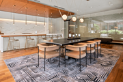 Minneapolis apartment for rent - A modern dining room with a black table and chairs.