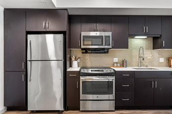 Modern kitchen at g12 apartments in los angeles, ca 90015