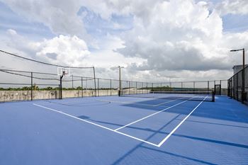 Outdoor sports court at one plantation apartments in plantation, fl 33324
