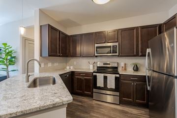 Raleigh apartment for rent - Renovated Kitchen at The Tribute Apartments in Raleigh, NC 27612