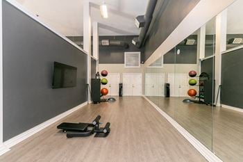 The gym at the flats at big tex apartments