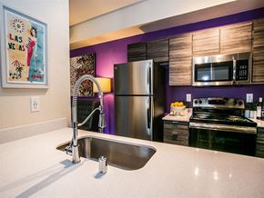 Las Vegas apartment for rent - a kitchen with stainless steel appliances and a sink