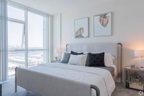 San Pedro apartment for rent - a bedroom with a large bed and a large window at Vue, Sand Pedro, CA 90731