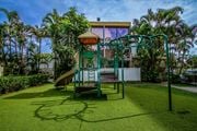 Wahiawa apartment for rent - a playground with a slide and a swing at Palms of Kilani Apartments, Hawaii