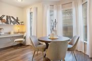 The Woodlands apartment for rent - a dining room with a table and chairs and windows at Volare at the Woodlands, Texas