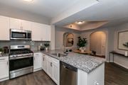 Atlanta apartment for rent - a kitchen with granite counter tops and stainless steel appliances at Willowest in Lindbergh, Atlanta, GA, 30318