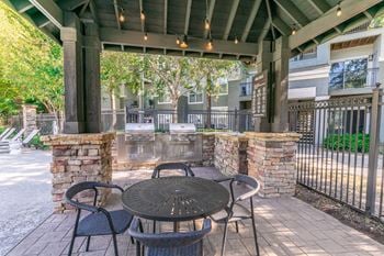 Outdoor grill with intimate seating area