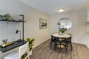 San Francisco apartment for rent - a dining room with a table and chairs and a mirror at Delphine on Diamond, San Francisco, CA