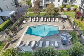 San Francisco apartment for rent - an aerial view of a pool with chairs and umbrellas at Delphine on Diamond, San Francisco, California