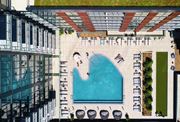 Chicago apartment for rent - A swimming pool surrounded by lounge chairs and umbrellas. at The Mason Apartments, Illinois, 60607