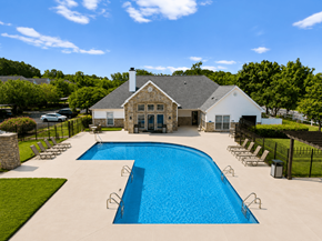Greenville apartment for rent - A large house with a pool in the backyard.