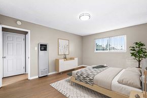 Santa Cruz apartment for rent - a bedroom with a bed and a white door