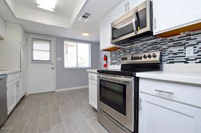 Phoenix apartment for rent - a kitchen with a stove and a microwave