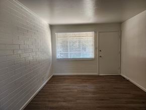 Scottsdale apartment for rent - an empty room with a window and a door