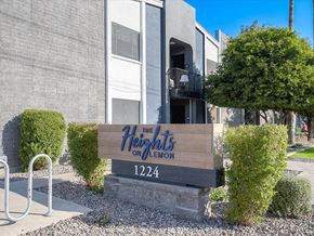 Tempe apartment for rent - a building with a sign that reads the heights on bloom