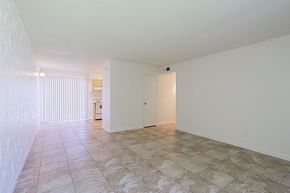 Scottsdale apartment for rent - A room with a tiled floor and a white door.