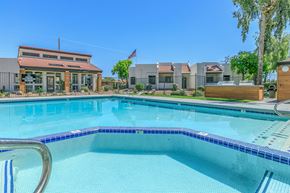 Mesa apartment for rent - a large swimming pool with apartments in the background at Saltéra Apartments, Mesa, 85204
