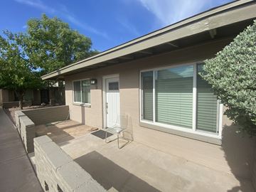 Phoenix apartment for rent - A house with a white door and a window with blinds.
