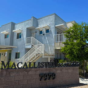 Scottsdale apartment for rent - the front of a building with the mcalister street sign in front of it