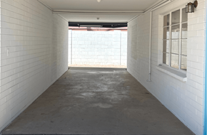 Phoenix apartment for rent - A white room with a window and a door.
