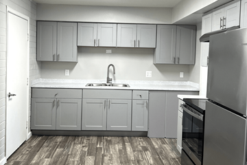 Phoenix apartment for rent - A kitchen with a sink and a refrigerator.