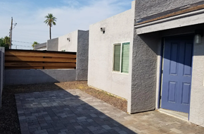 Phoenix apartment for rent - a house with a blue door and a walkway in front of it