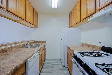 Phoenix apartment for rent - the kitchen of our apartments has a stove refrigerator and sink