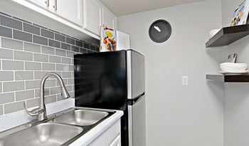 View of refrigerator and sin