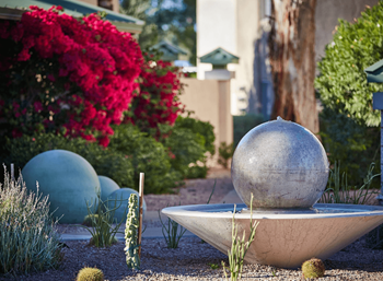 Elegant fountain with desert landscaping