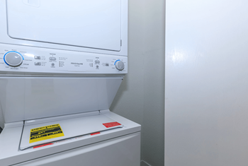In-unit stacked washer and dryer 