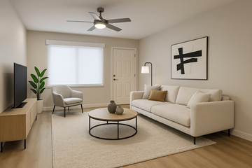 Phoenix apartment for rent - A living room with a white couch, a television, a plant, a chair, a coffee table, and a painting on the wall.