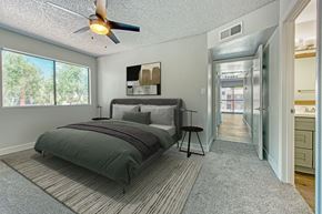 Glendale apartment for rent - A bedroom with a bed and a ceiling fan at Tela Verde Apartment Homes, Glendale
