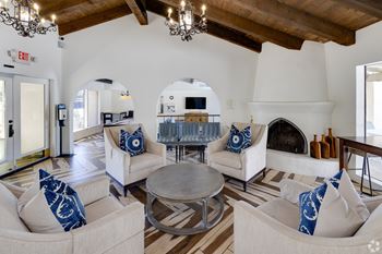 A living room with a fireplace and a couch.